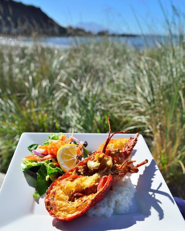 Crayfish meal served  on the road side from Kaikoura Seafood BBQ Kiosk, Kaikoura. South Island New Zealand